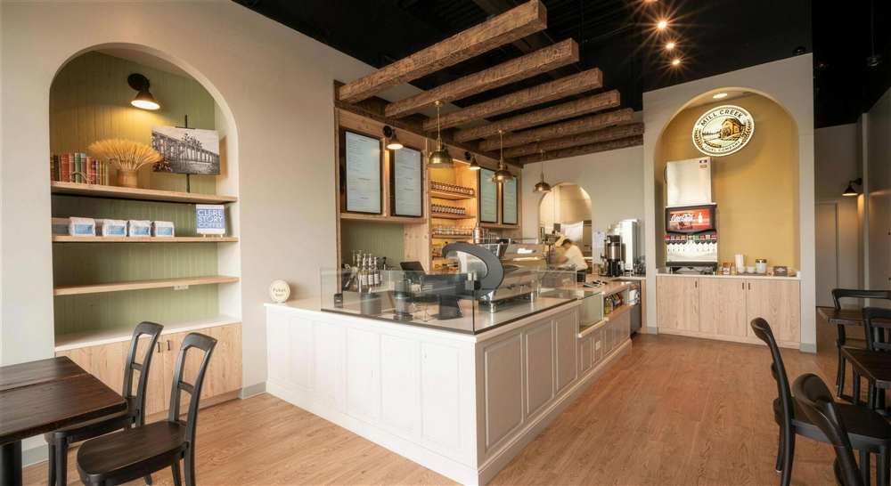 Mill Creek Bagel Company interior showing B&C custom millwork and guest-facing finish